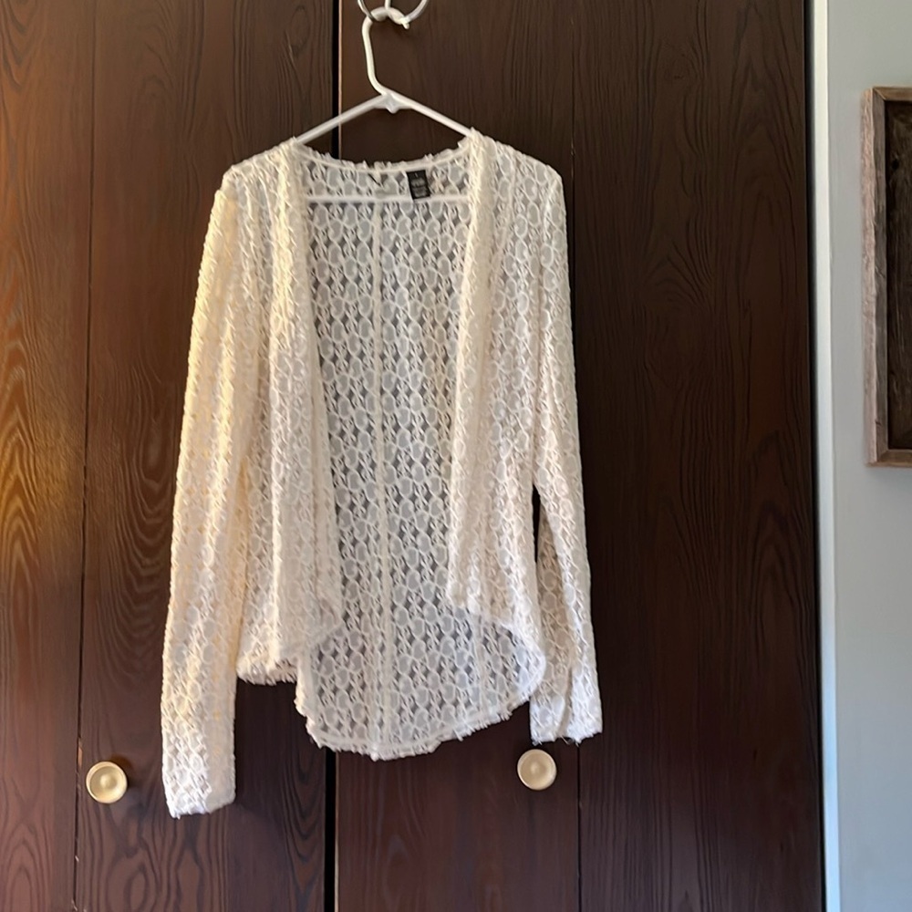 BKE Boutique cream lacy long sleeved shrug.  but seems a little smaller than L.